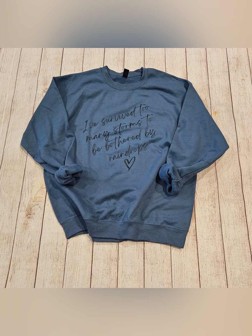 I've Surived Too Many Storms To Be Bothered By Raindrops Crew Sweatshirt NEW